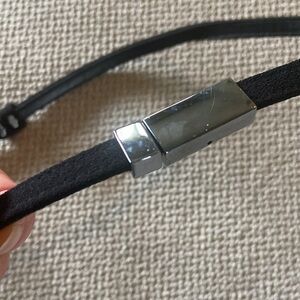 Ann Taylor skinny black belt with silver closure. 29” adjustable.